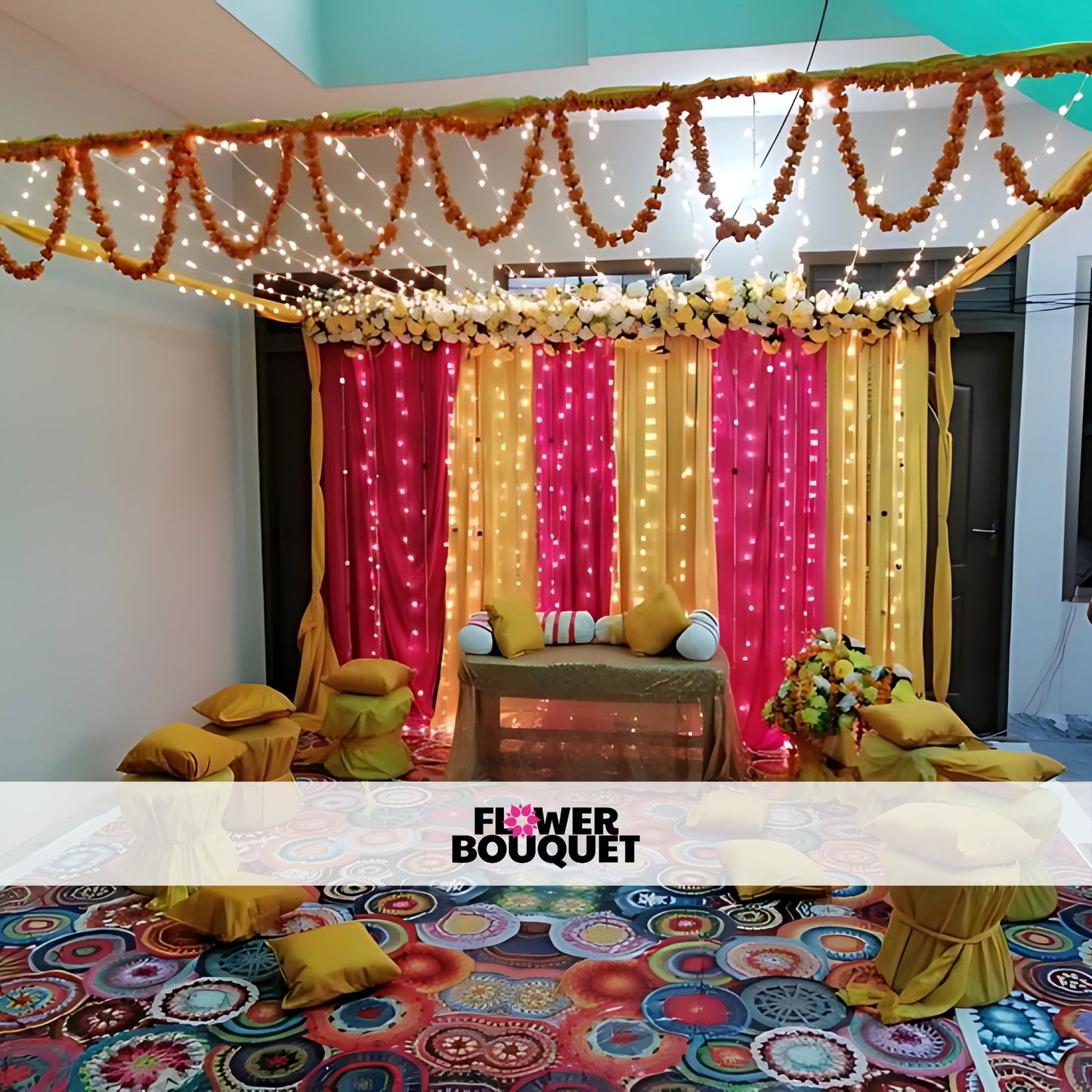 Indoor Mehndi decor with marigold strings, pastel flowers, pink and yellow drapes, fairy lights, and cozy seating for an elegant setup.