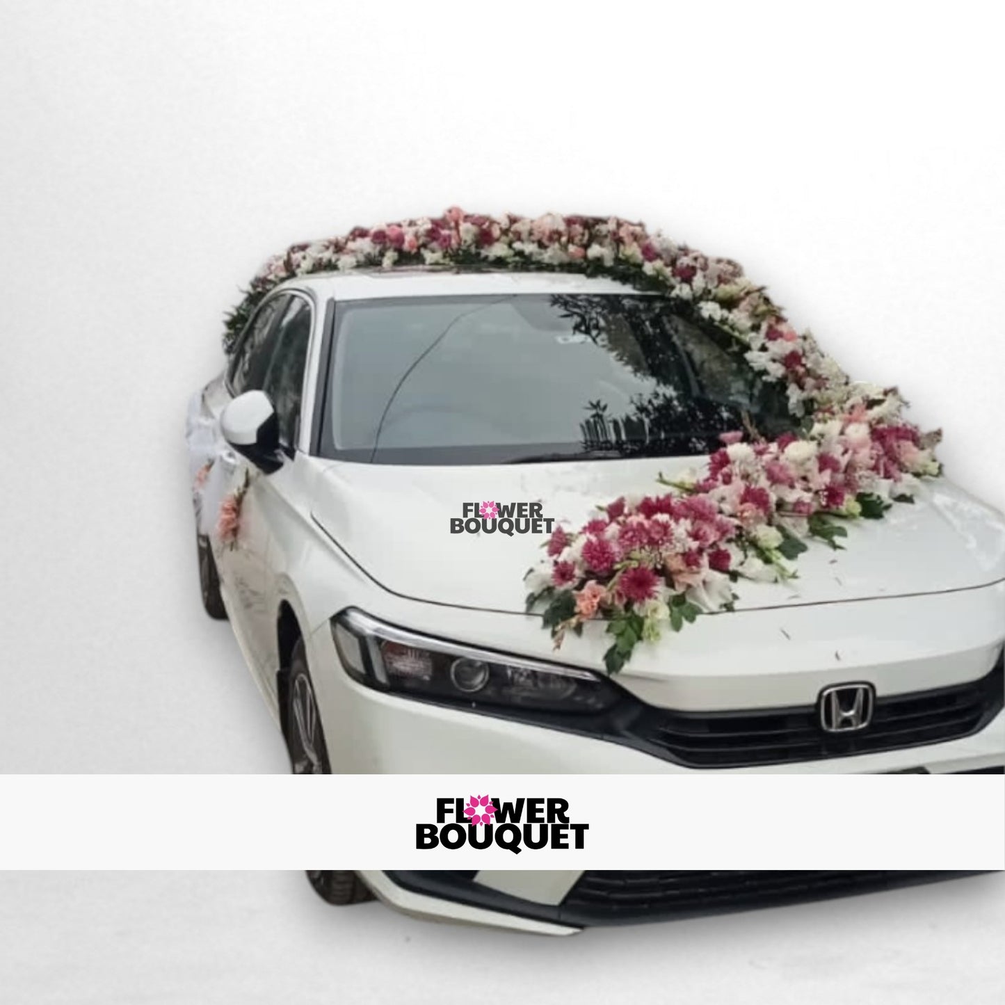 White Honda car decorated with pink and white flowers.