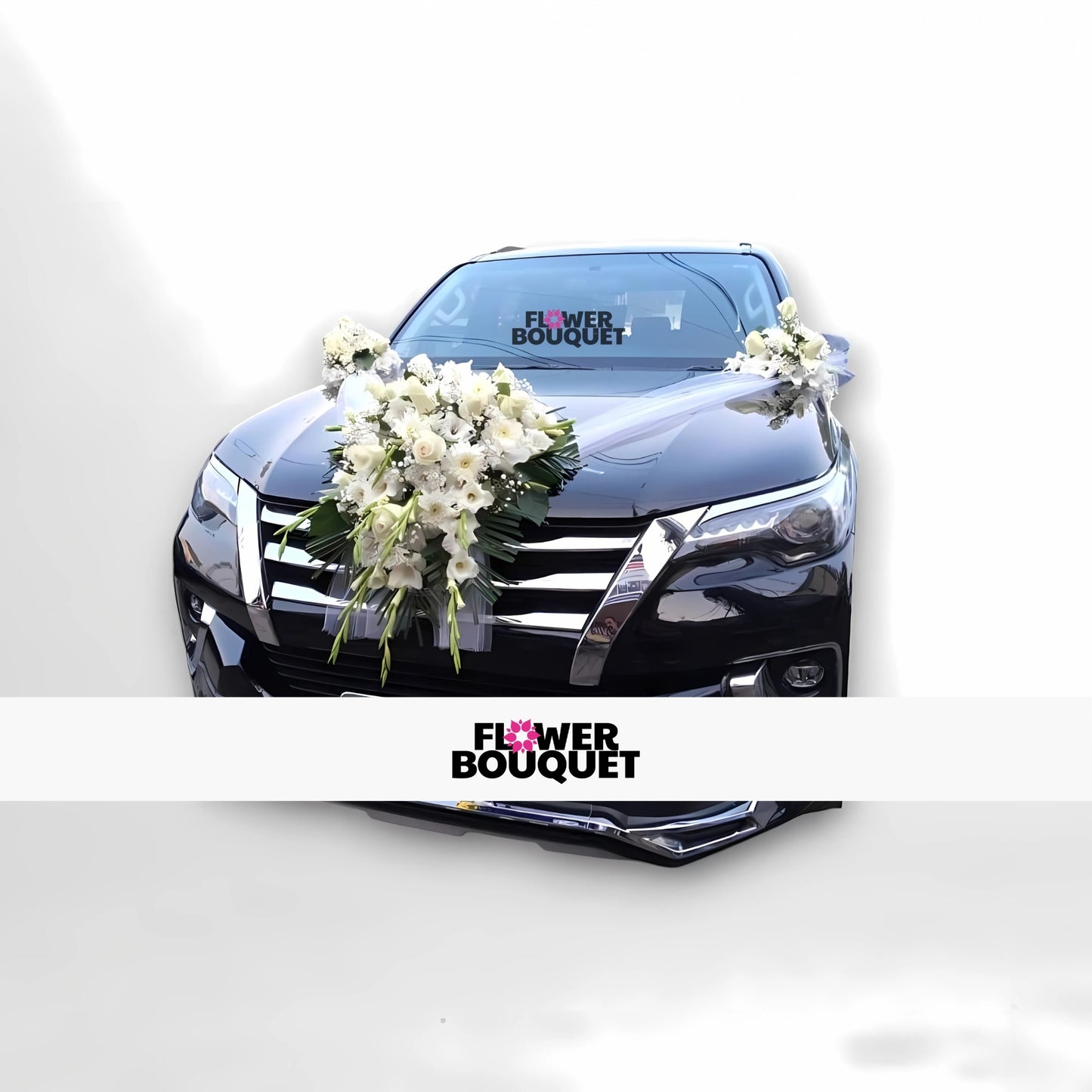 Black car decorated with white flowers on the hood and side mirrors.