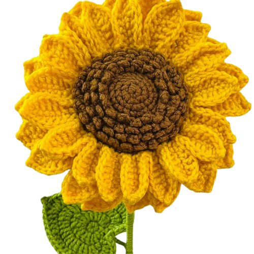 Handmade crochet sunflower with yellow petals, brown center, and green leaf on a stem.