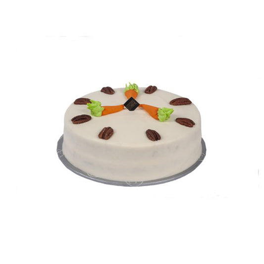 "Kitchen Cuisine Carrot Cake with cream cheese frosting, walnuts, and carrot decorations, available in Lahore, Karachi, and Islamabad"