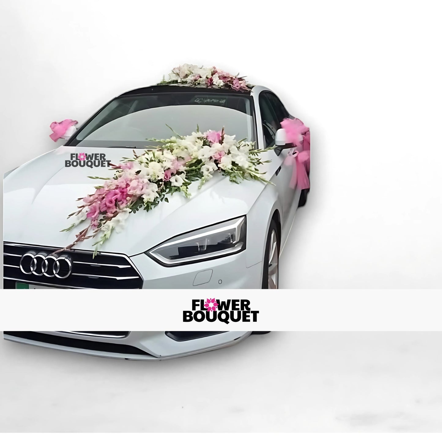 White Audi car decorated with pink and white flowers and pink ribbons.
