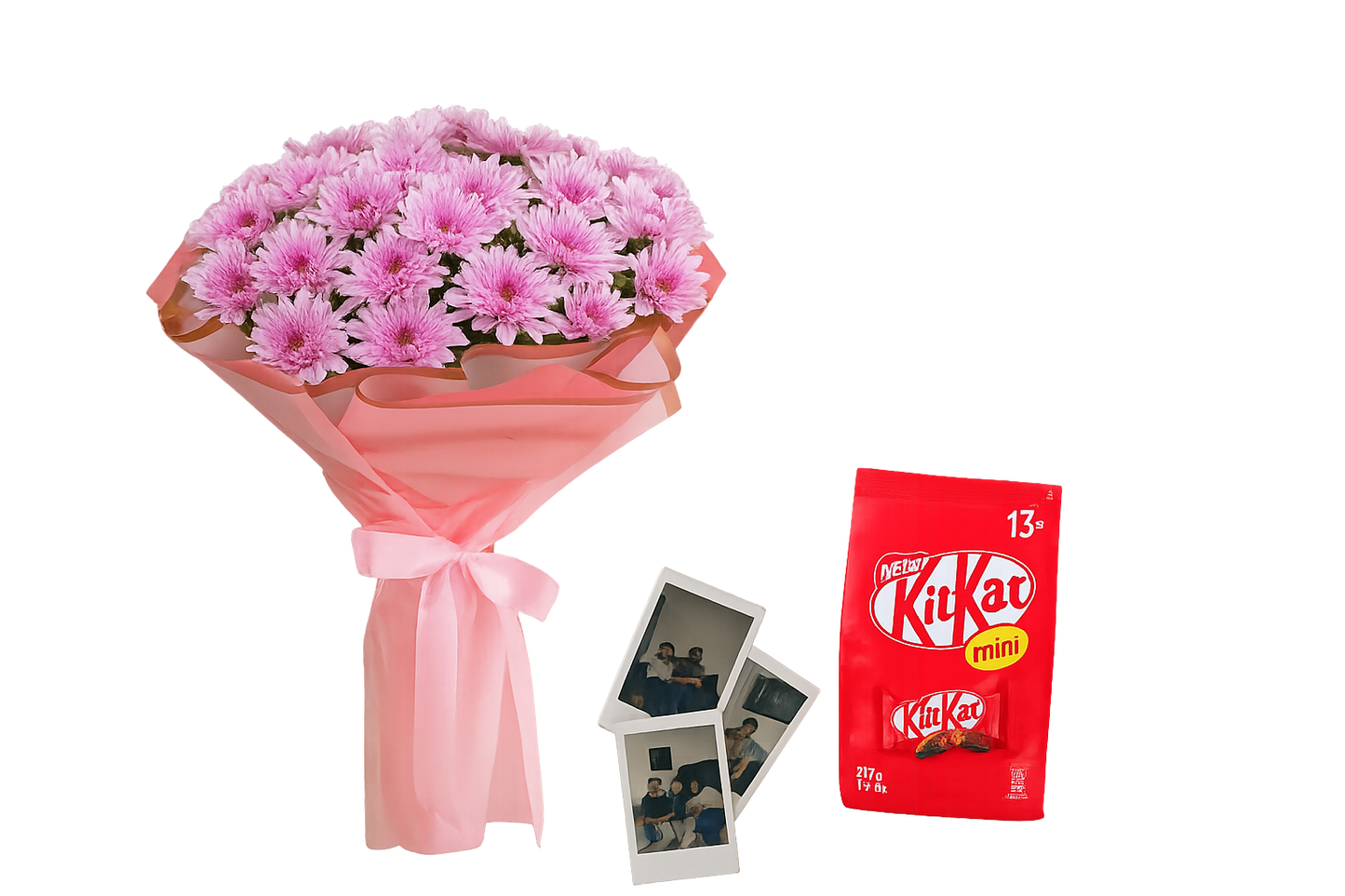 Pink chrysanthemum bouquet wrapped in soft pink, paired with a red pack of KitKat mini chocolates and three printed Polaroid photos – sweet and personal gift combo.