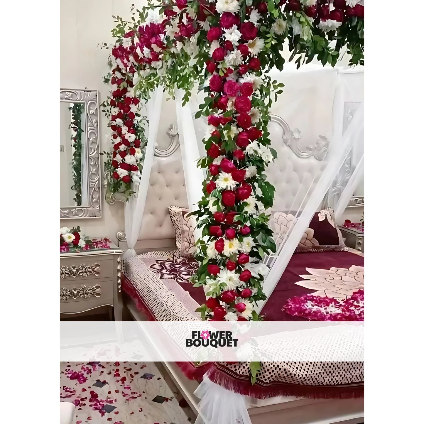 Romantic Flower Canopy Bed Decor with red and white flowers, green foliage, maroon and beige bedspread, and rose petals.
