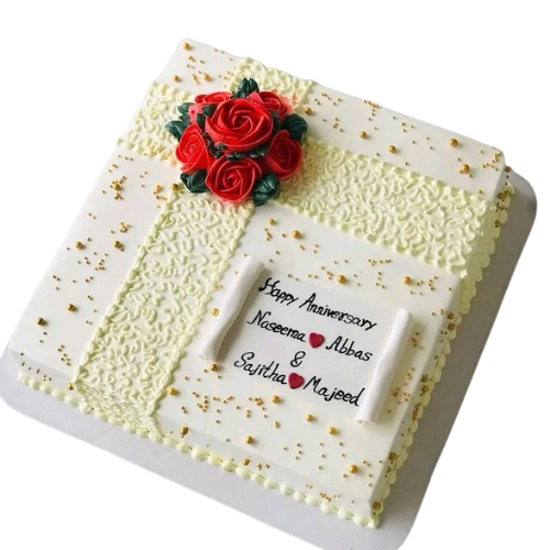 Square anniversary cake with red roses, golden accents, and personalized message.