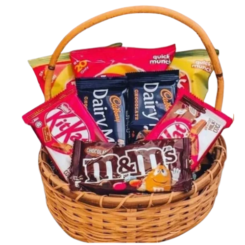 Sweet Treats Gift Basket with KitKat, Dairy Milk, M&M’s and snacks in a natural woven basket