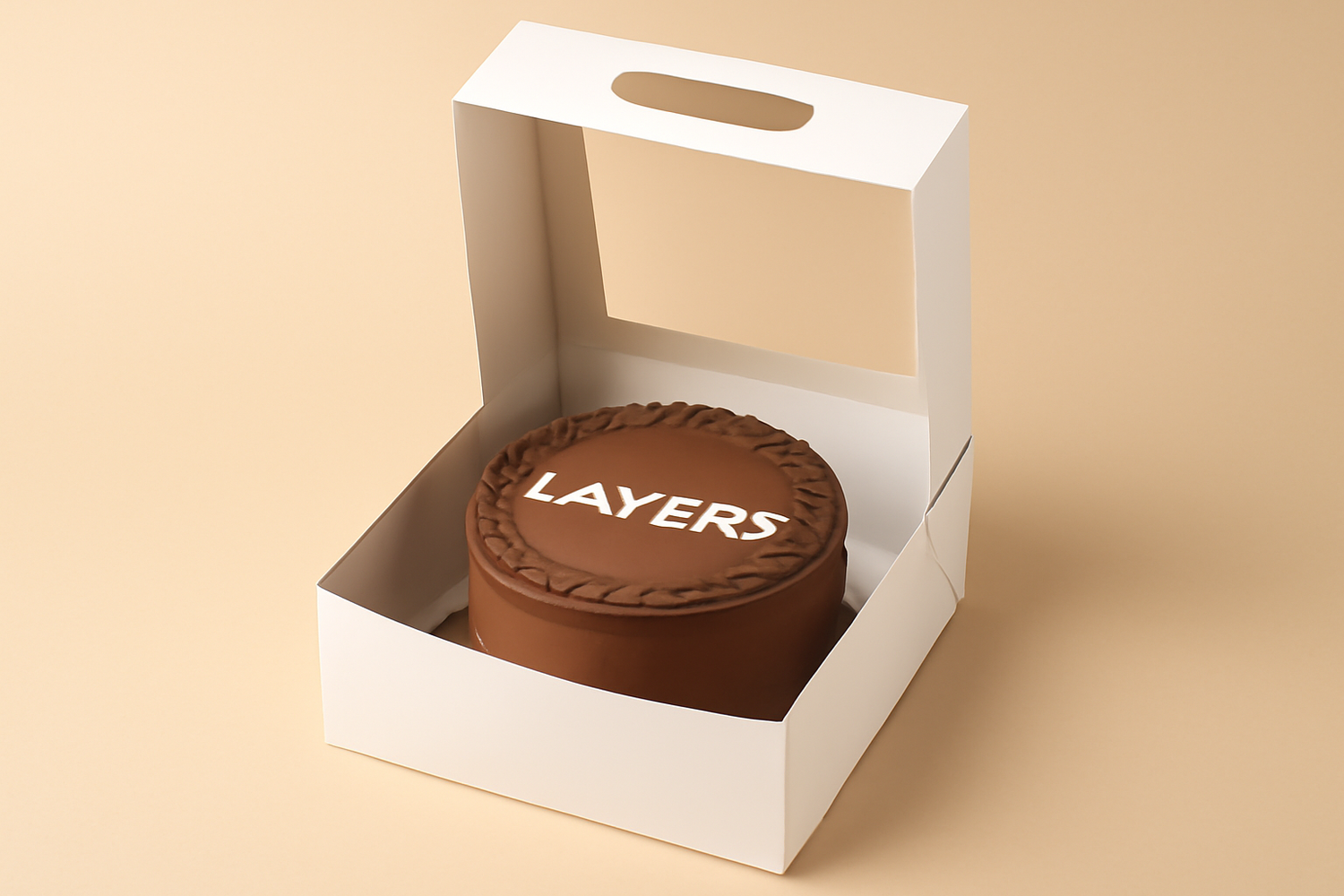 Single-layer chocolate cake with smooth frosting and decorative piping, displayed in a white cake box, showcasing elegant packaging for premium cakes.