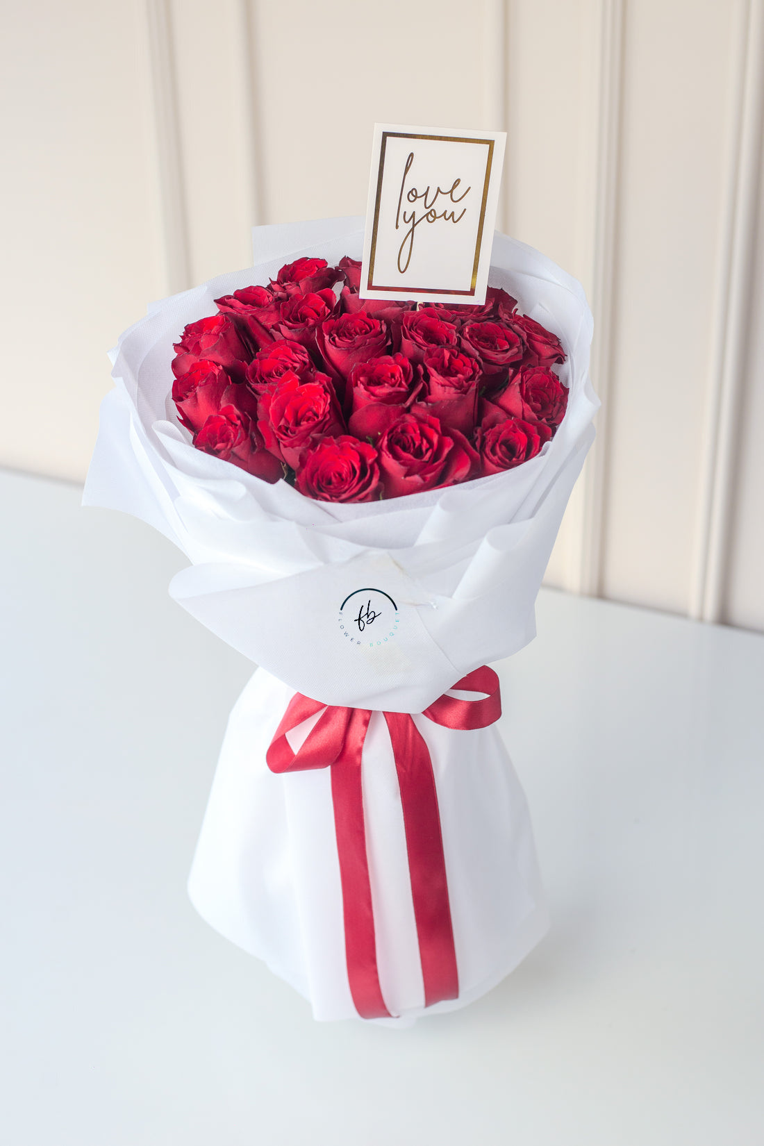 red rose anniversary flower bouquet, with white wrapping best gift for her and him