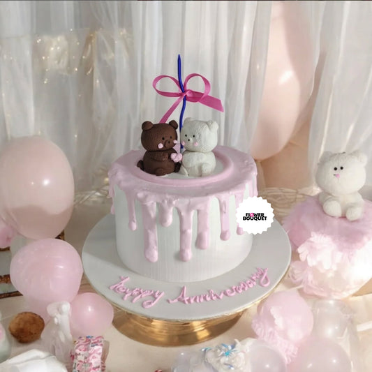 Pink and white anniversary cake with plush bear and bunny figurines, dripping frosting effect, and ribbon bow - a whimsical and heartfelt celebration.