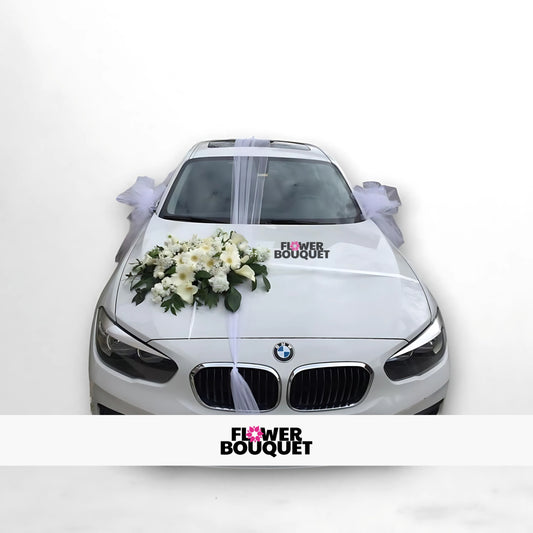 White BMW decorated with elegant white floral bouquet and lavender tulle ribbons for weddings, Flower Bouquet logo visible.