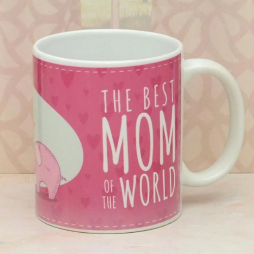 Pink ceramic mug with “The Best Mom of the World” and elephant design