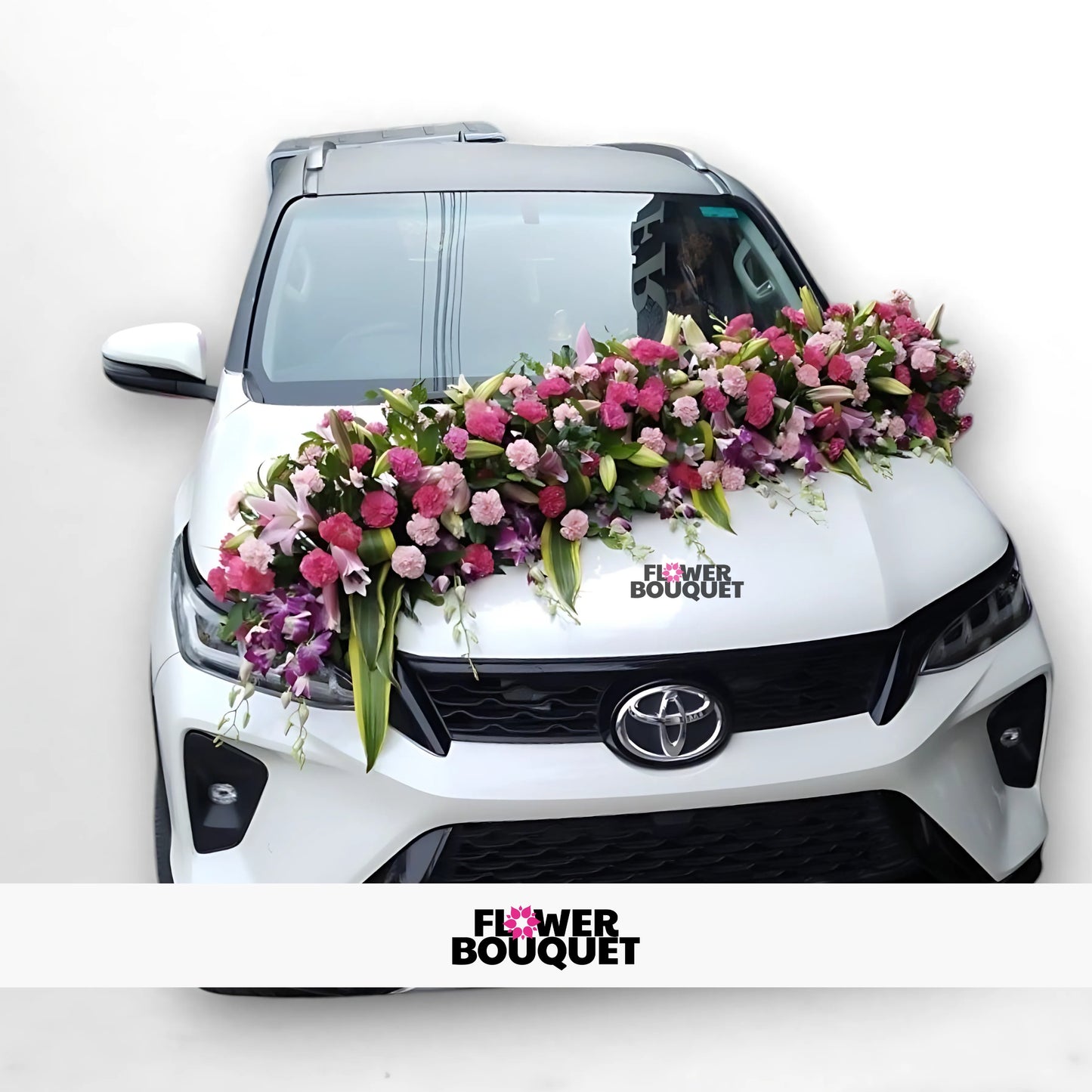  White Toyota decorated with cascading pink, purple, and white floral arrangement for weddings, Flower Bouquet logo visible.