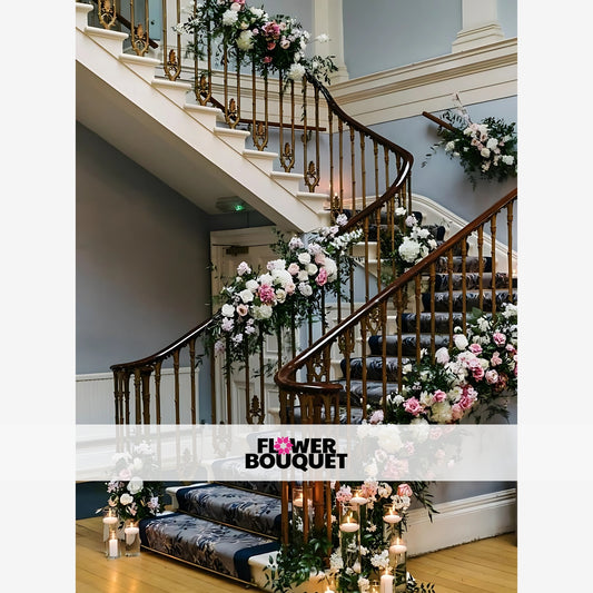 A grand, ornate staircase adorned with a stunning display of lush, cascading floral arrangements, creating a magical and romantic ambiance.