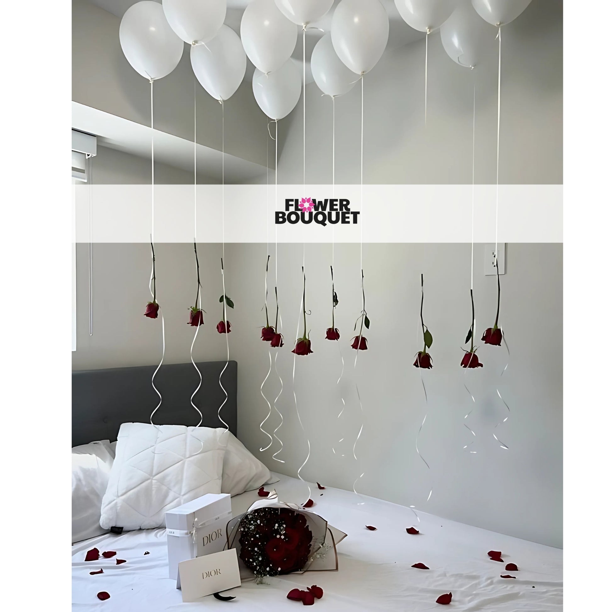 Enchanted Balloon and Rose Bedroom Decor with white balloons, red roses, white bedding, rose petals, and Dior gift boxes.