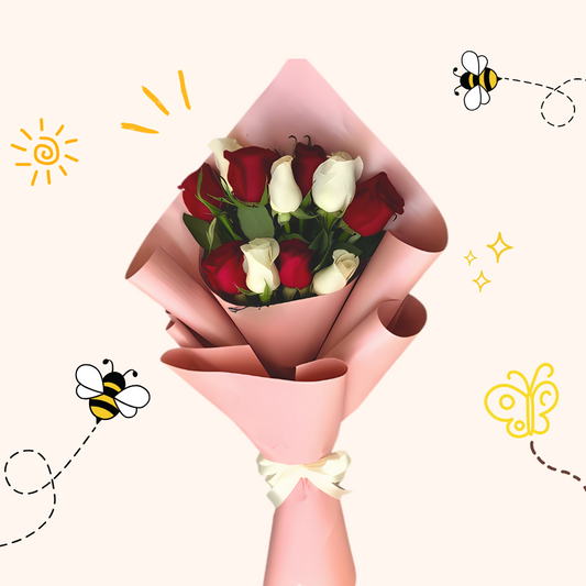 Eternal Harmony bouquet with red and white roses wrapped in pastel pink paper and tied with a white satin ribbon — same-day flower delivery in Pakistan.