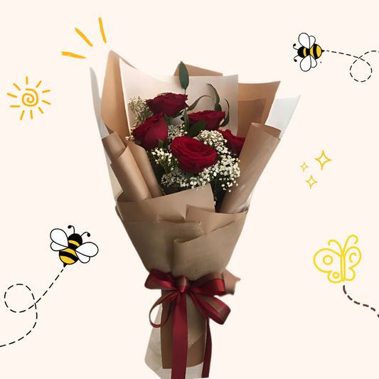 Crimson Charm bouquet with red roses and baby’s breath wrapped in kraft paper – same-day flower delivery in Pakistan