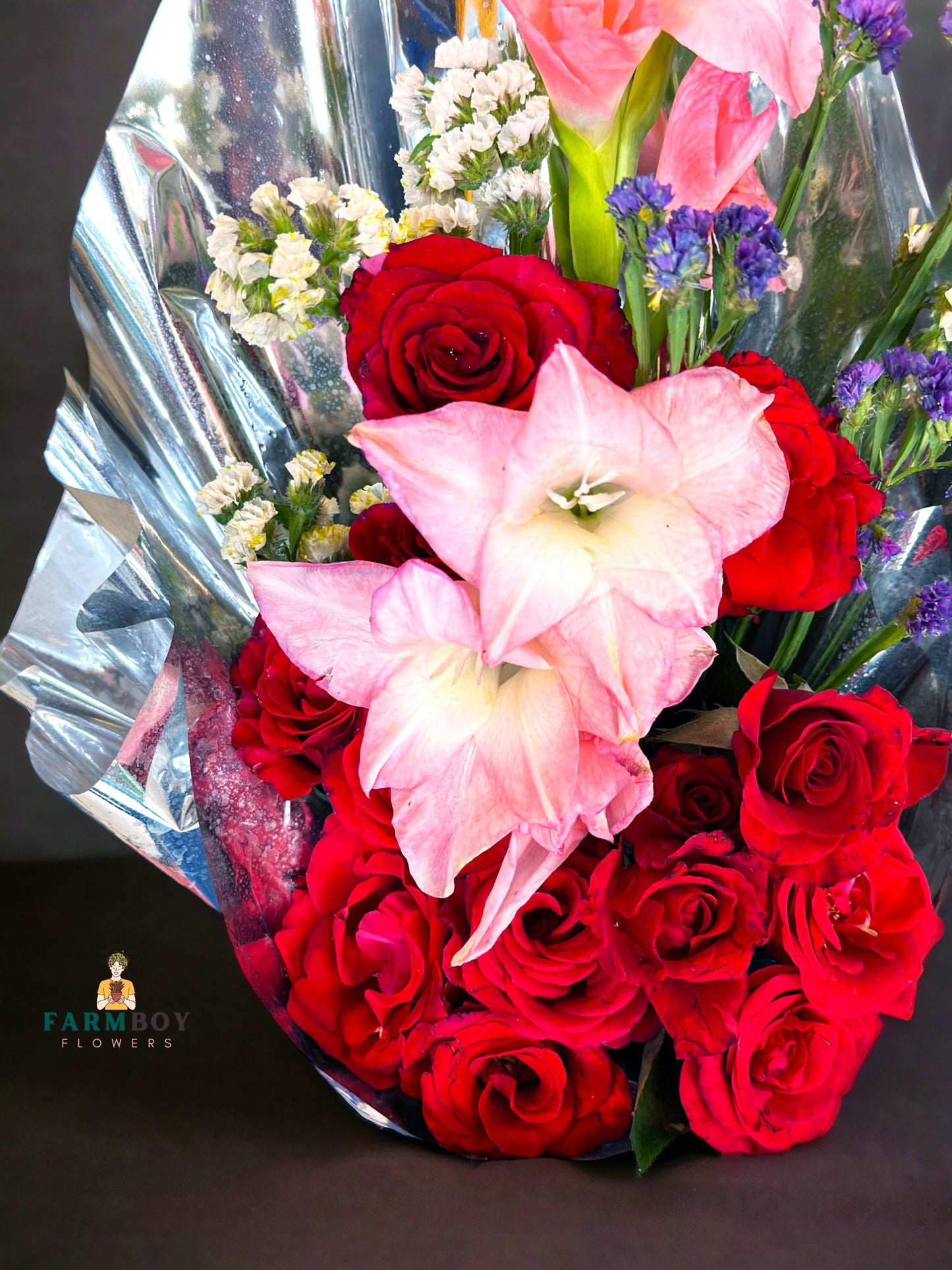 red roses small bouquet lay on table