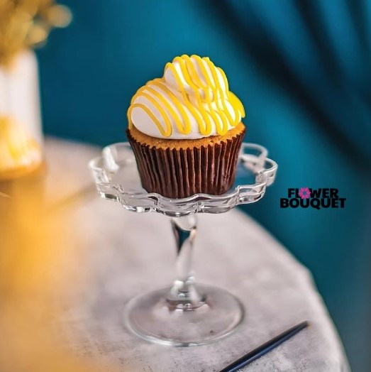 A beautifully crafted Keylime Cupcake with lime-infused frosting, tangy glaze, and vibrant citrus zest, perfect for a tropical dessert treat.