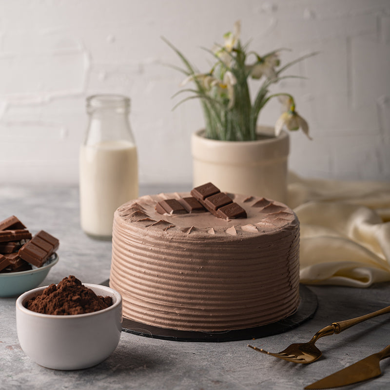 "Kitchen Cuisine Cadbury Chocolate Cake with Cadbury chocolate cream and topping, available in Lahore, Karachi, and Islamabad"