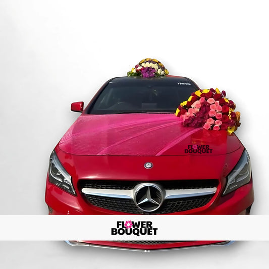 Red Mercedes-Benz decorated with colorful flower bouquets on roof and side for weddings, Flower Bouquet logo visible.