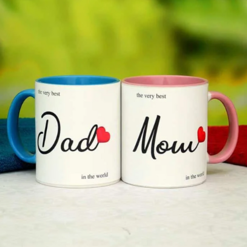 Matching ceramic mugs for Mom and Dad with “The Very Best” quote and pink/blue accents