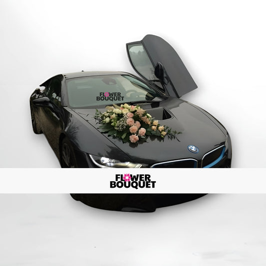 Black BMW i8 with butterfly door open, decorated with pastel floral arrangement on hood for weddings, Flower Bouquet logo visible.