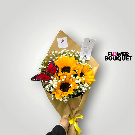 A vibrant bouquet of sunflowers, baby's breath, and a red butterfly, creating a cheerful and enchanting floral arrangement.