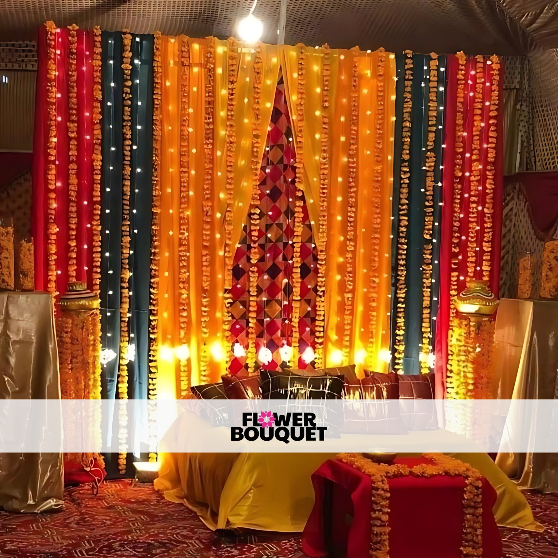 Traditional Mehndi decor with marigold strings, yellow, orange, and red drapes, along with floor seating for a festive ambiance