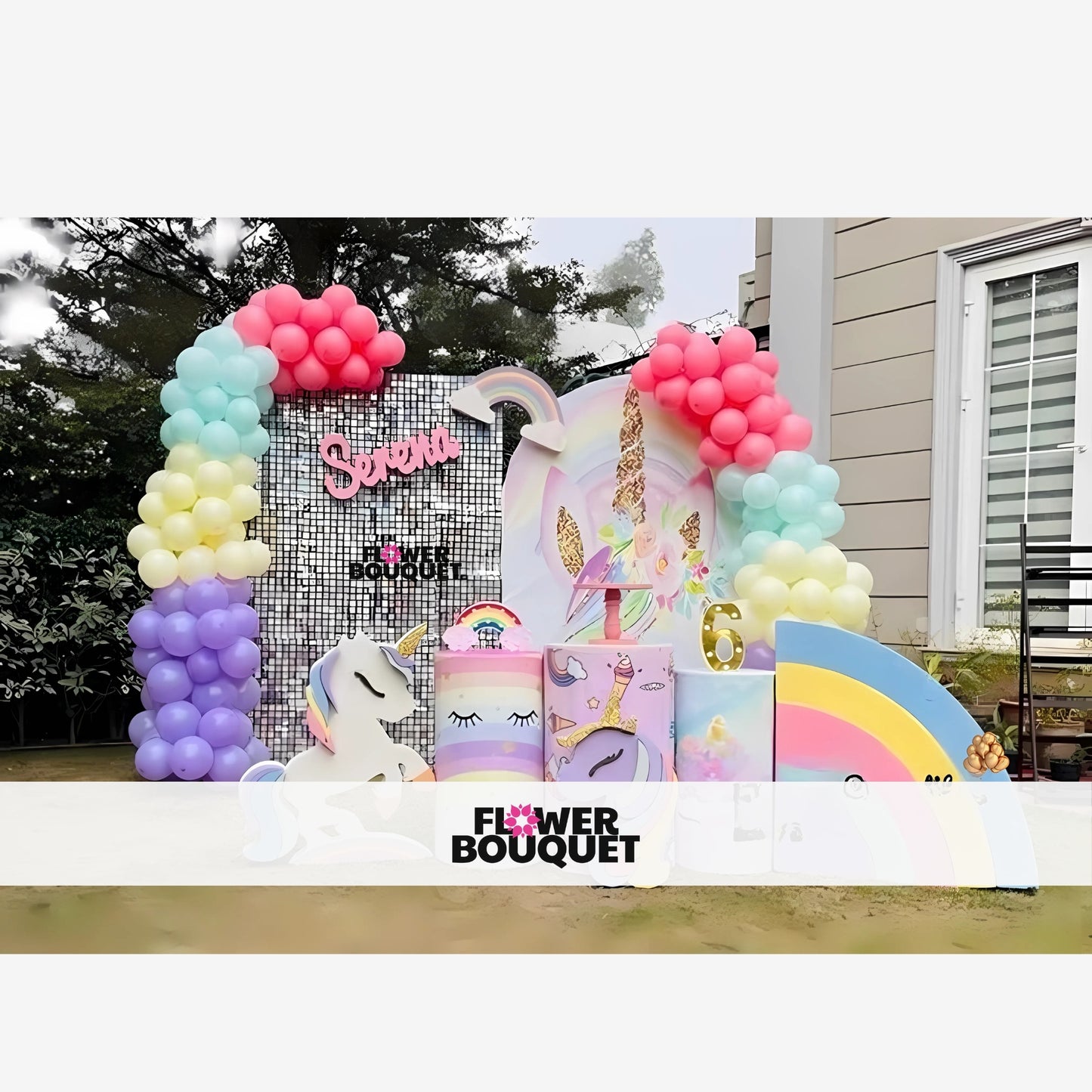 Unicorn birthday party decoration with a large unicorn head, glittery golden ears and horn, pastel-colored balloons, pink cursive name 'Serena,' rainbow arch, and golden number '6,' creating a magical and festive atmosphere.