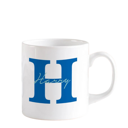 White ceramic alphabetic mug with blue letter design – stylish personalized coffee mug for gifting