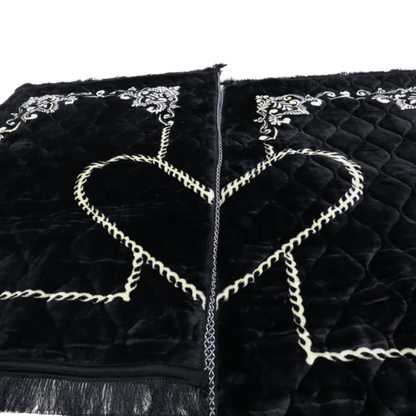 Elegant black velvet couple prayer mats with heart-shaped embroidery, perfect Islamic gift set for weddings and Eid.