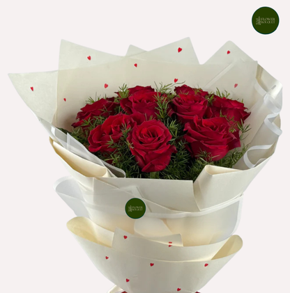 romantic seven red roses bouquet with heart printed wrapping paper