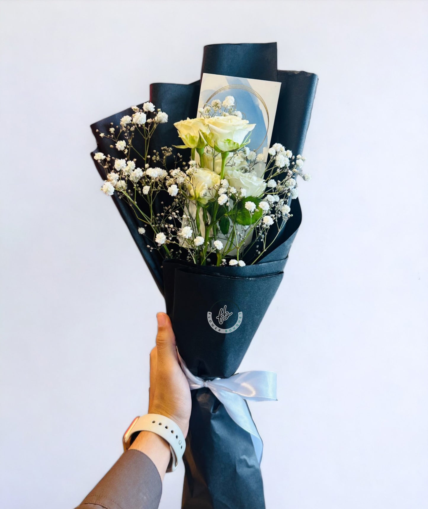 white roses with baby breath budget friendly flower bouquet with imported roses